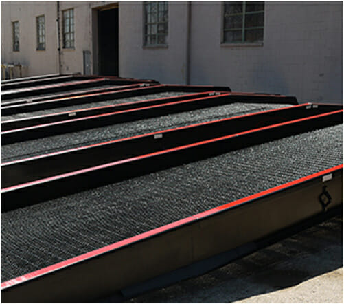 Copperloy yard ramps - image of mobile yard ramp rentals lined up