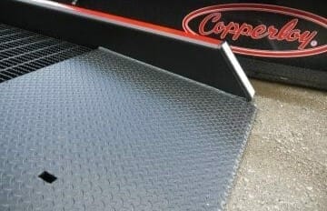 Safety curbs on mobile yard ramp